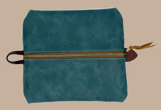 Leather or embroidery product image leather teal toiletry bag top left