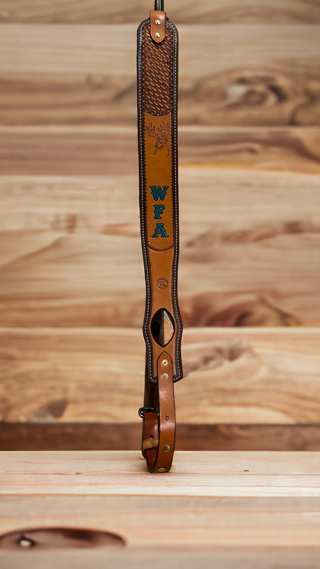 Handmade gun sling with custom tooled, dyed, and painted initials on veg tan leather with pyrography whitetail buck Lafayette Louisiana